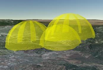 Tres cúpulas amarillas transparentes cuya parte trasera es visible a través de la parte delantera